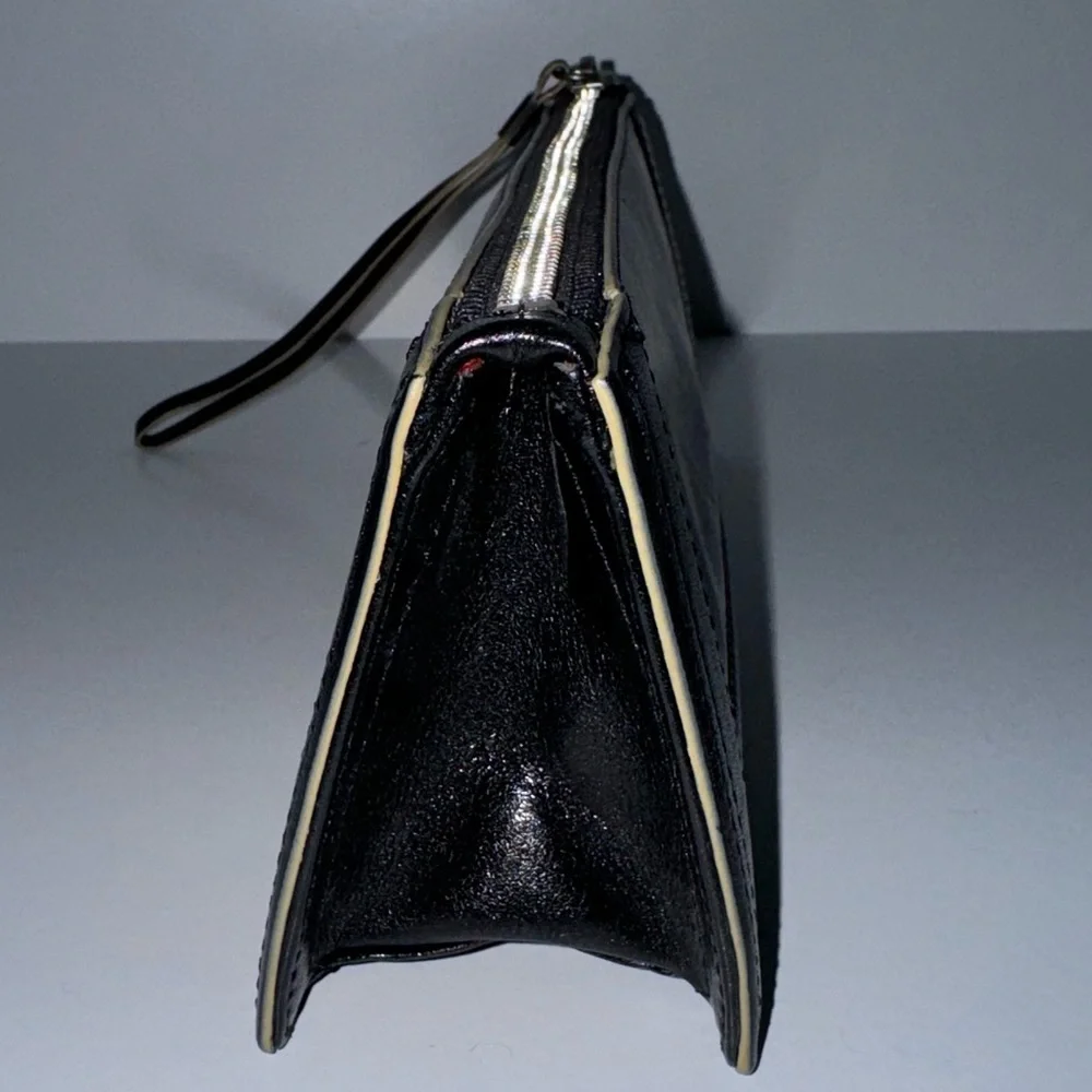 Ellen Tracy Black Leather Clutch with red logo interior.